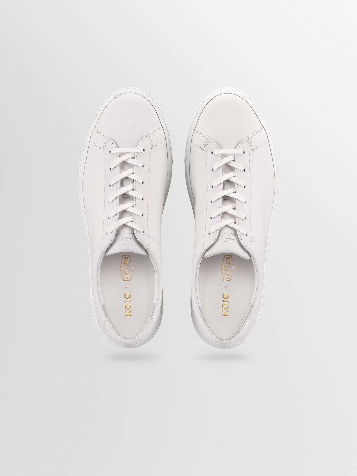Capri Leather Sneaker in Triple White Rose Anvil