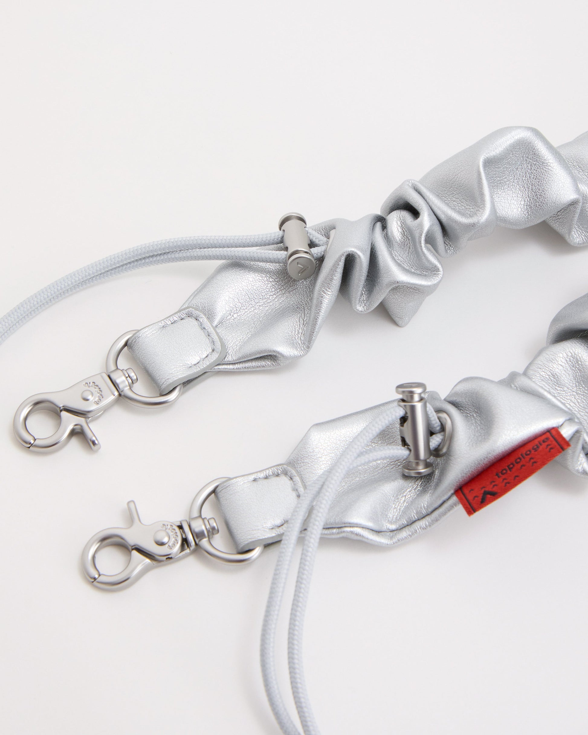 Topologie Chrome Bottle Bungee Strap